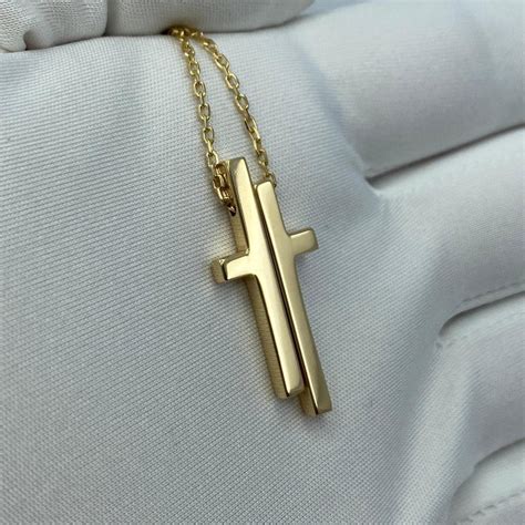 gucci split cross necklace.